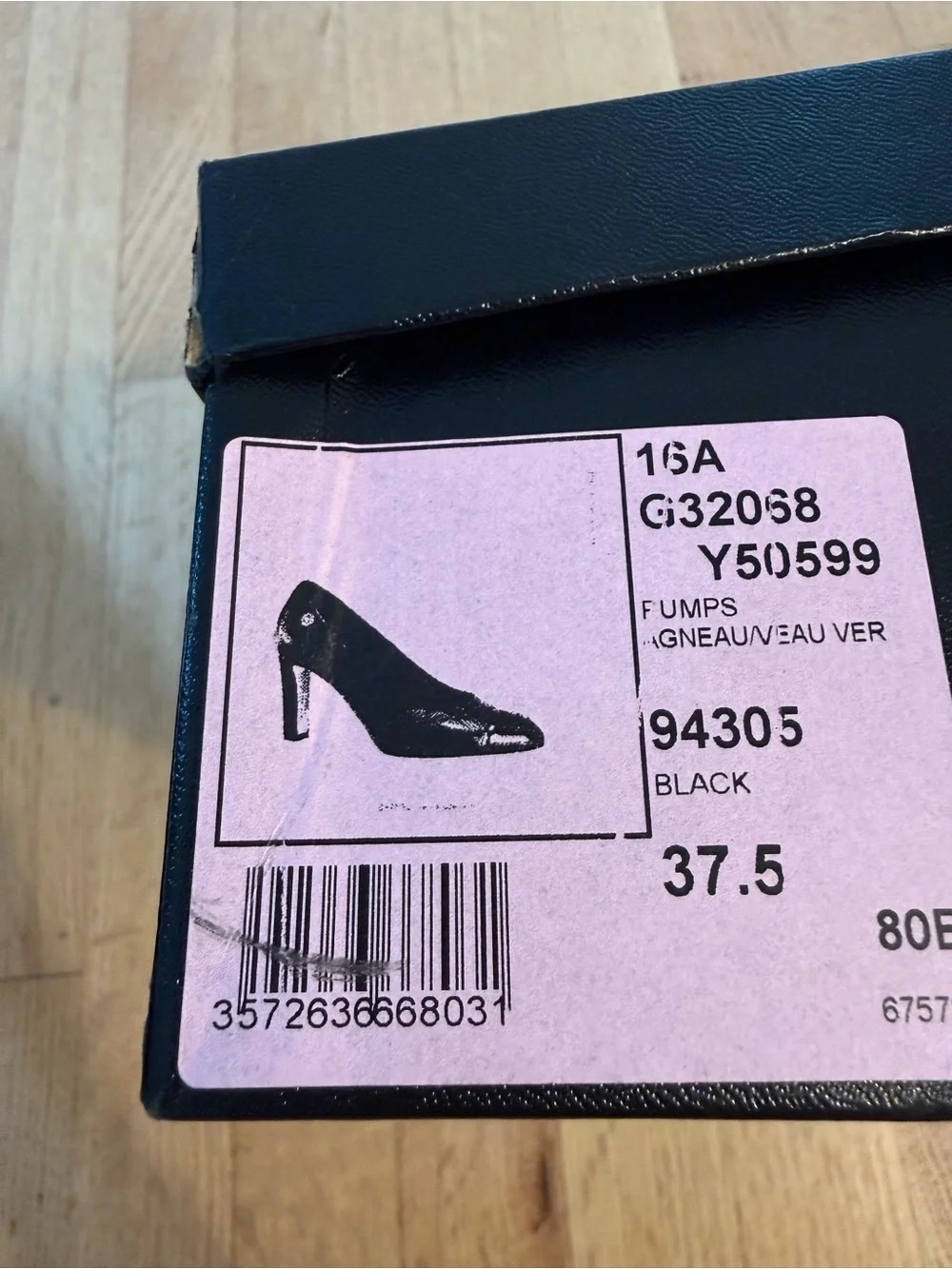 CHANEL Black Quilted Leather Cap-Toe Pumps with Patent CC